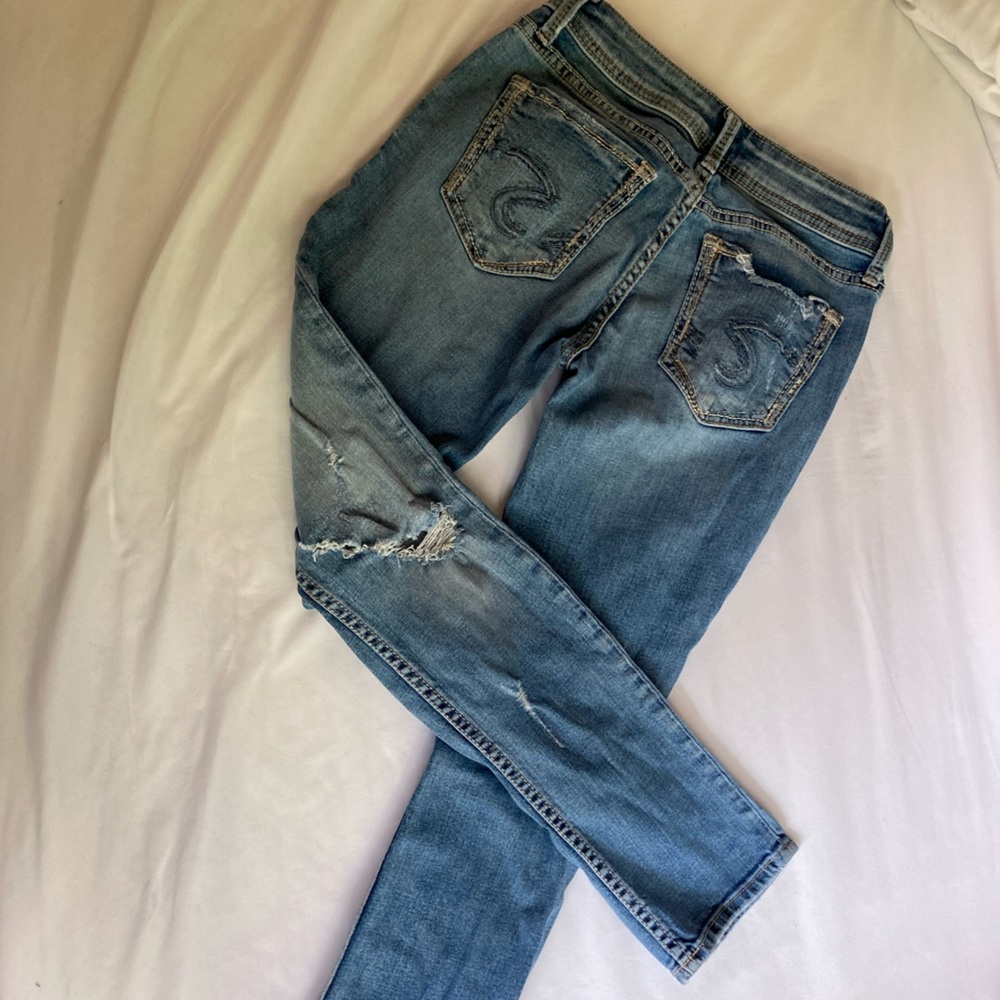 Silver ripped jeans